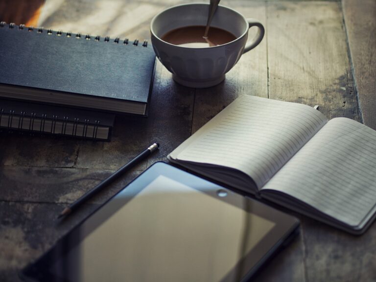 Sunday reflection and weekly planning with journal and coffee